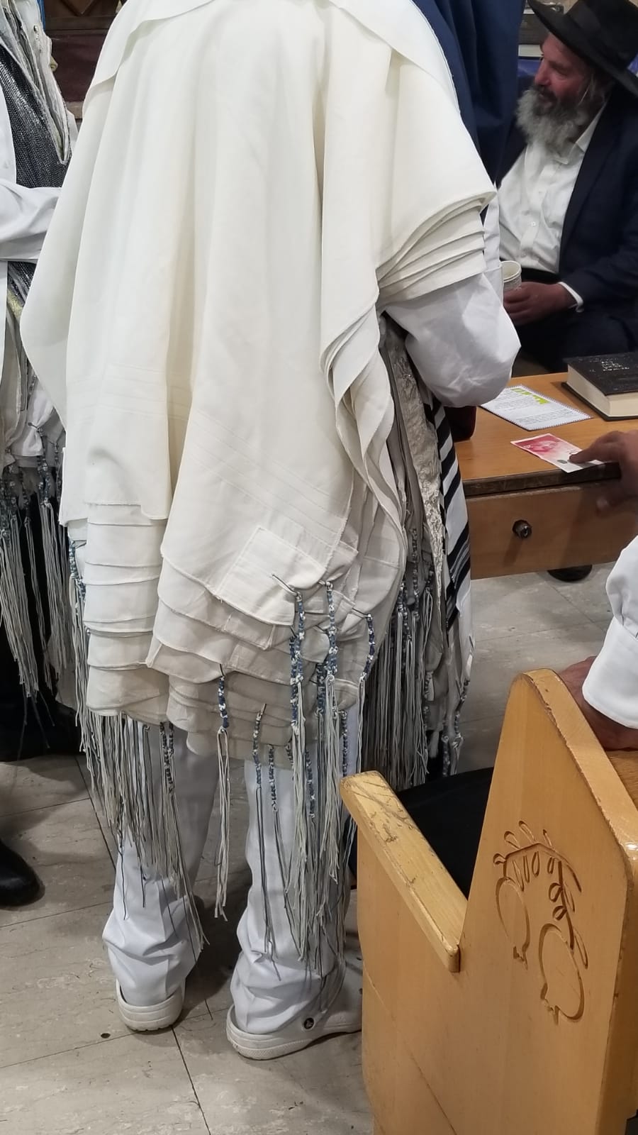 Rabbi Dov Kook wearing tzitzis 
